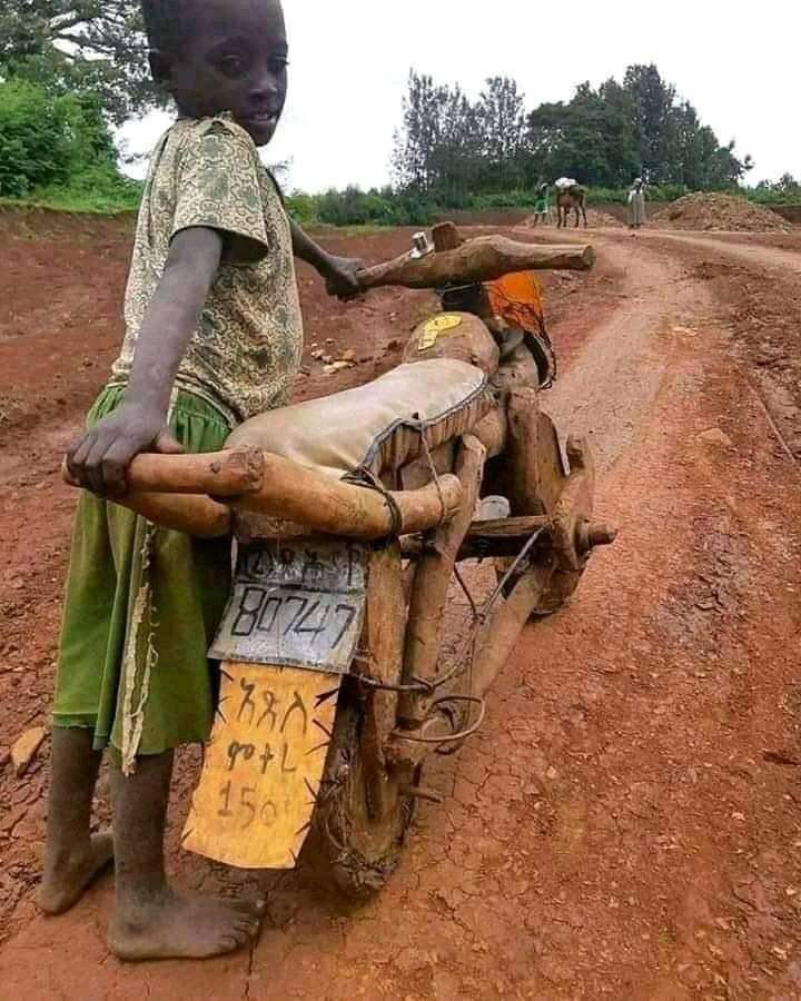 This child holding wooden made motorcycle.
May his dream come true ❤️
#AfghansNeverAcceptDurandLine
#AxiosOnHBO
#NCOC #InternationalYogaDay 
#Dream