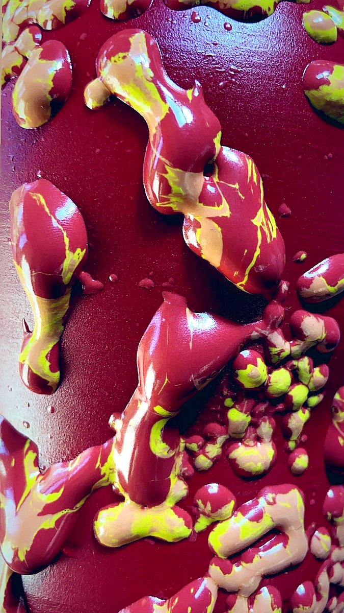 I made this vase and this trippy glaze: