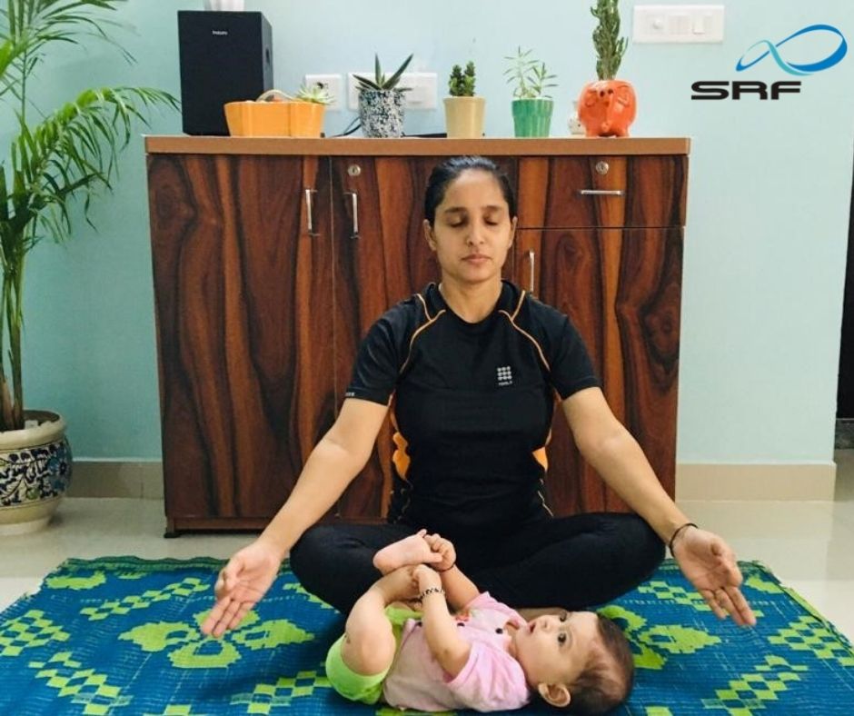 srflimited's tweet photo. At SRF, we start young! How adorable is this picture of our colleague, Priyanka Dhaka and her baby practicing #yoga meditation #LifeAtSRF #YogaDay https://t.co/Iua9oJugja