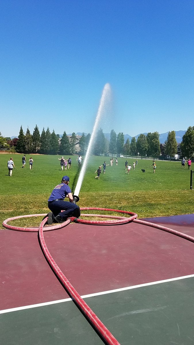 <a href="/SnoqualmieFire/">Snoqualmie Fire Dept</a> out today on the hottest day of the year, cooling the community.