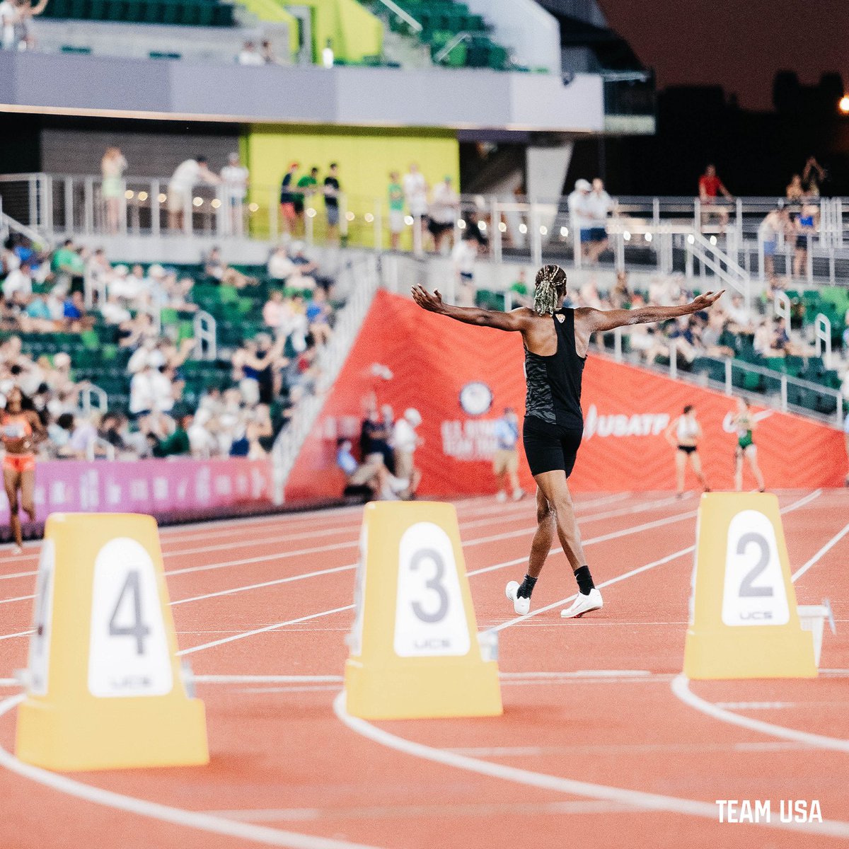 JuVaughn Harrison with his arms out taking in the crowd.