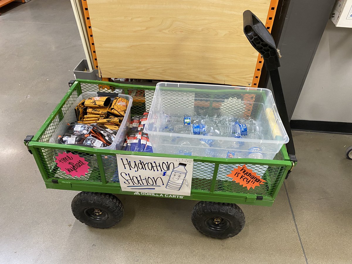 Passing out Water, Sunglasses, Can Coolers, and cooling Bandanas to keep the Associates Hydrated. 😎😎😎