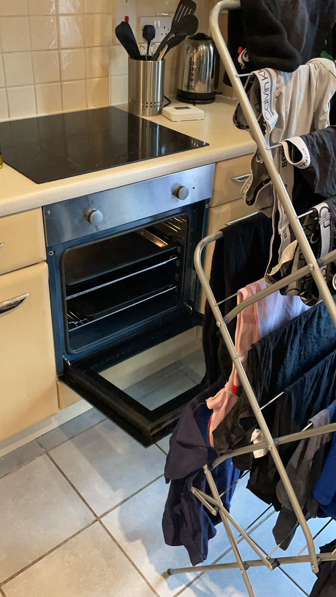OscarPiastri's tweet photo. Need to dry some clothes for a dinner tonight, and also pack a couple of days worth of stuff. No dryer in the flat, so the oven it is. I believe this falls under the ‘if it works it’s not stupid’ category 😂 https://t.co/iEMss2IUjW