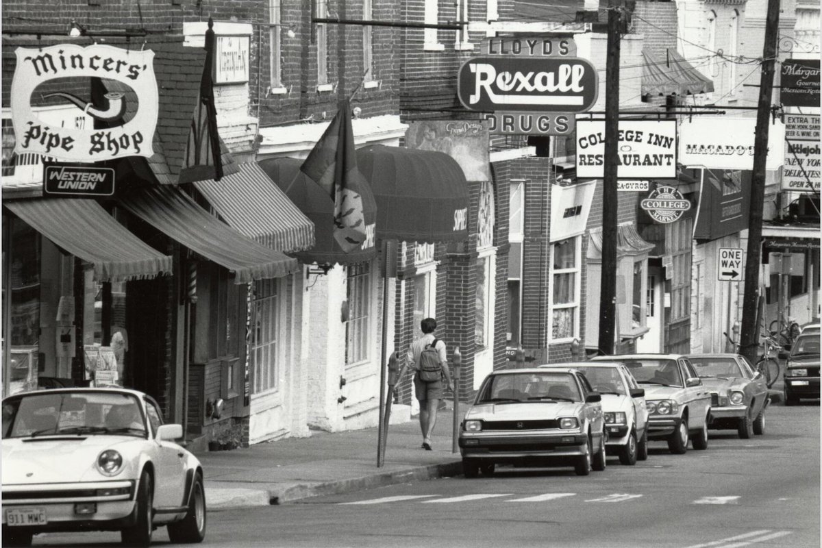 UVA's tweet photo. Then and now ➡️ The Corner consists of eight blocks chock full of shops and restaurants, representing the intersection of the University and the greater Charlottesville area. The first picture was taken back in 1987. https://t.co/ujFNbIsBGa