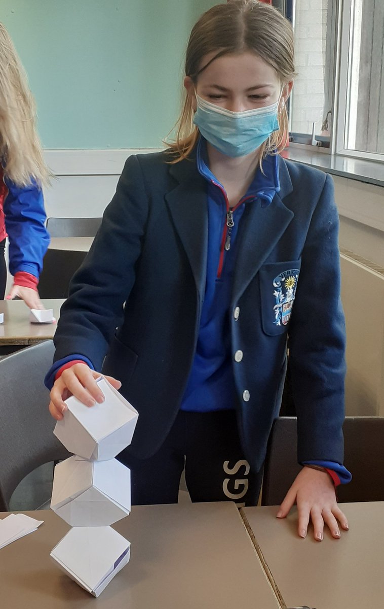 Building a tower of Columbus cubes... much harder than it looked!  Grace showing how it's done! #Math #geometry