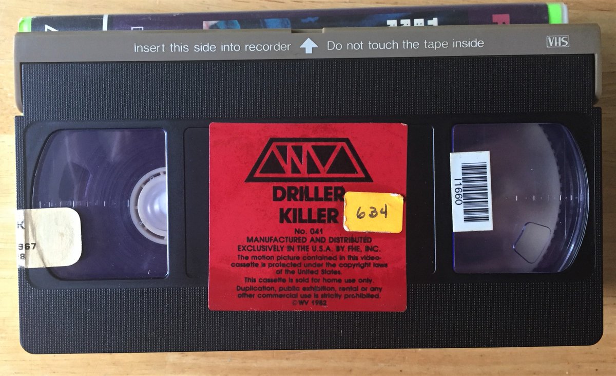 simplejamsYT's tweet photo. 1982 Wizard Video slipsleeve (cut to fit #clamshell) VHS of The Driller Killer. Purchased from Video Week in NY, 1998.
#HorrorMovies #horror #HorrorCommunity #VHS #vhslives #vhscollection #horrorvhs #rarevhs #videotape #bekindrewind #videocollector #vhscollector #wizardvideo https://t.co/JJNF8kFNTR