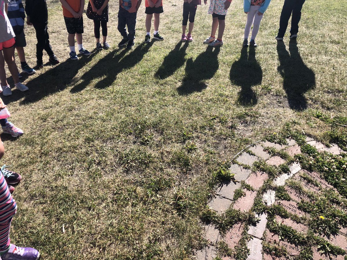 215 seconds in silence with our orange flowers today to honour the indigenous children that died at the Kamloops residential school. On each petal we wrote one way that children should be able to feel at school