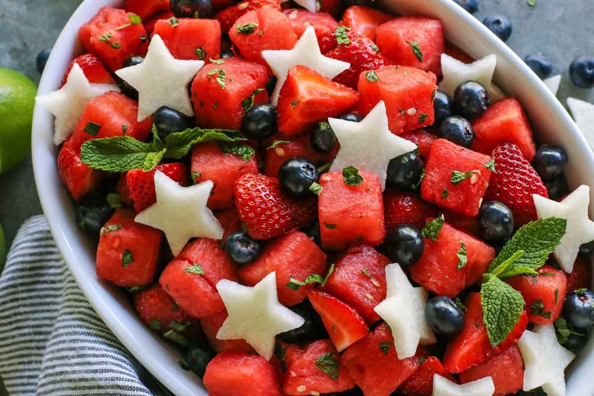FarmgirlsDabble's tweet photo. Mojito Fruit Salad recipe with watermelon, strawberries &amp; blueberries + jicama stars - perfect for the 4th of July! >>> https://t.co/3Et0e1Z6W8 https://t.co/f7Drzl7TKv