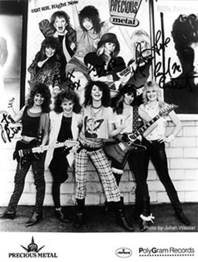 Back in the day, Janet was in all girl band, Precious Metal.
Here she is with them, celebrating their record release with a painting of their record on the side of Tower Records, Sunset Blvd, 1985!