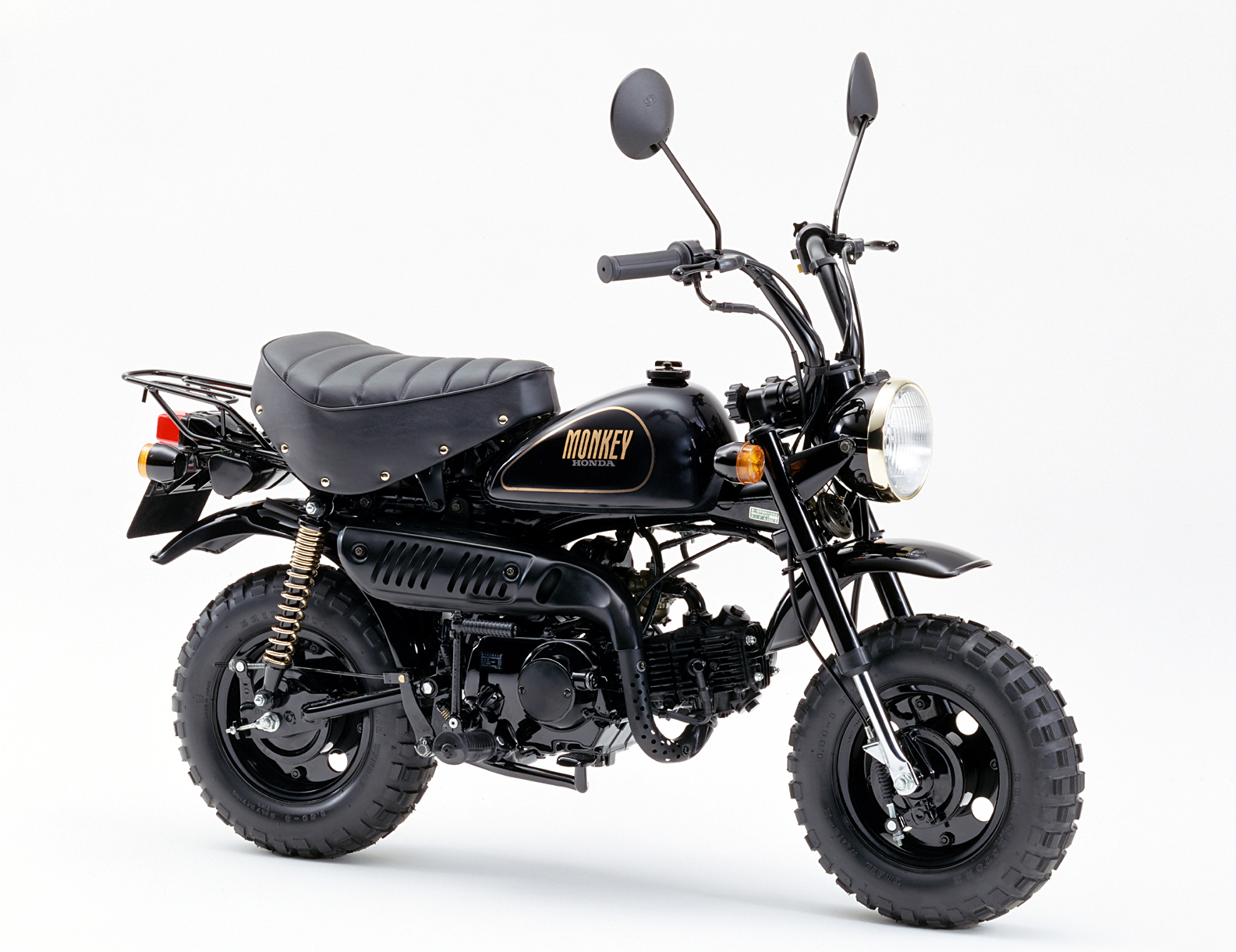 Honda History 歴代ホンダバイク 1990年代 Monkey 90 1990年1月 モンキー にhonda新春大会用の限定カラーモデルの通称 ブラックモンキー を発売 空冷4サイクル単気筒ohc 排気量49cc 最高出力3 1ps 7 500rpm 最大トルク0 32kgf M 6 000