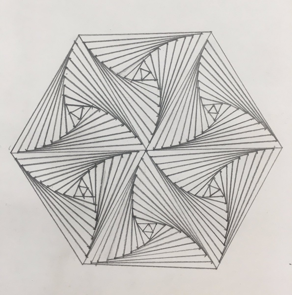 Lovely ‘curves of pursuit’ designs from the 4th form yesterday #mathsisfun