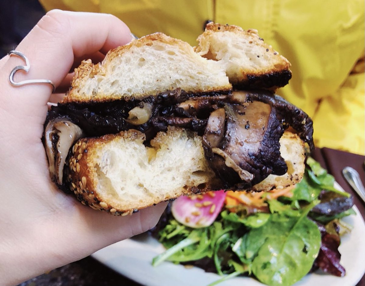 FloretSeattle's tweet photo. When sandwiches look like this, it's pretty dang hard to resist 🤩 Layers of portobello mushrooms, caramelized onions, and swiss cheese inside a seeded baguette and served with our garlic mushroom au jus 😱 

Photo: @eat_real_shit https://t.co/NXTDlVgZpp