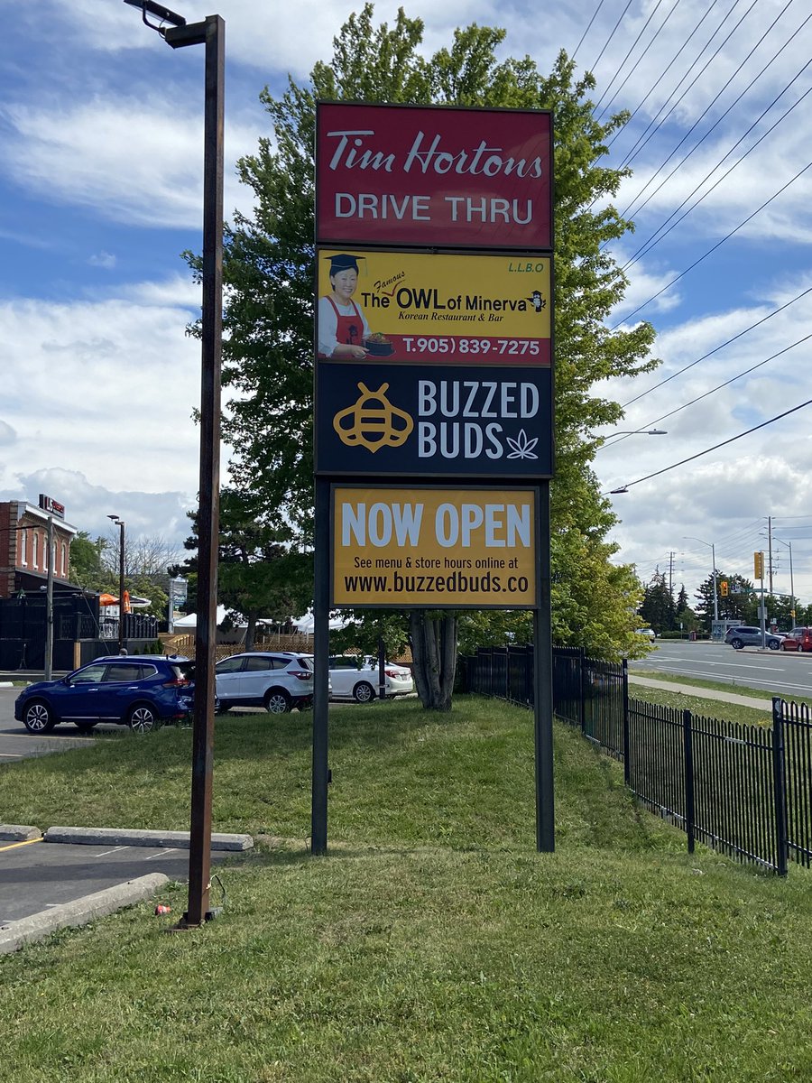Smartlinkus's tweet photo. Pylon signs no up, it official, Buzzed Buds is “Now Open” in Pickering. https://t.co/zzqh0REAcX