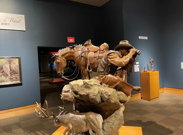 ncwhm's tweet photo. Morning! Looks like the horse knows more than the cowboy in this Prix de West sculpture by Bill Nebeker called “If Horses Could Talk.” This is what happens if you don’t have your morning mug of Arbuckles, cowboy. Lol! #HashtagTheCowboy Thanks, Tim https://t.co/YBJf8UerJc