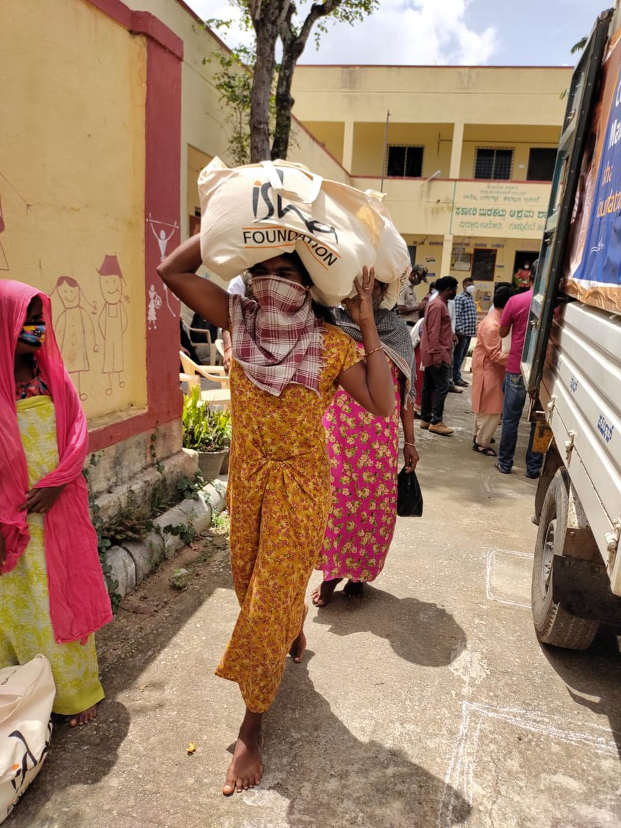 SadhguruImpact's tweet photo. On International Day of Yoga, Isha volunteers distributed ration kits to 250 tribal families in Chamarajanagar district, Karnataka, while Isha's Hatha Yoga teachers taught Yoga practices to the locals to improve their immunity and respiratory health. 

#IshaCOVIDAction https://t.co/WFjzePdpsJ