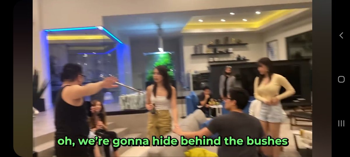 _tiwala's tweet photo. i can't help but think.... does anyone know this lady l? she seeems to be touching/holding Ryan Higa's hand?? saw this on fuslie's vlogg #nohate #OTVSMP #OTVandfriends #nigahiga https://t.co/fL3UiyEtFn