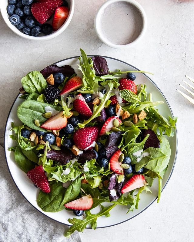 This berry salad is light, so tasty, fresh, and makes great leftovers! Use your favorite berries (I used my favorite three -- strawberries, blueberries, blackberries) and toss with your favorite greens, drizzle with a tahini dressing, and add chopped almonds for crunch.