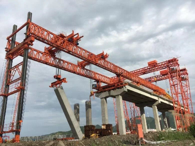 Girder Launcher
A launching gantry (girder launcher ) is a special-purpose mobile gantry crane used in bridge construction, specifically segmental bridges that use precast box girder bridge segments or precast girders in highway and high-speed rail bridge construction projects.