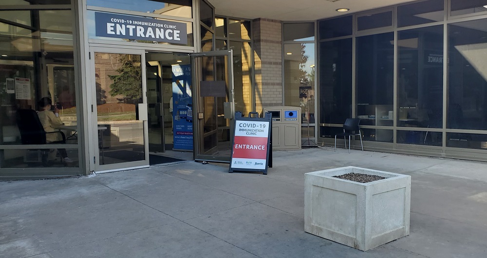 Barrie360's tweet photo. The RVH-led COVID-19 vaccination clinic at 29 Sperling Drive has hundreds of first dose appointments available today. If you haven't gotten your first dose, bring ID (preferably a health card) to the clinic anytime before 8 p.m. https://t.co/q5Pt7XZMzH