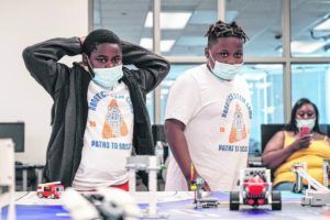 'Aiden Ash, left, Samaree Jones watch their @LEGO_Education #robot complete tasks during a #robotics competition in STEM camp at Columbus East High School in @columbusin Friday, June 11, 2021.' Mike Wolanin | The Republic 

#STEMEducation #INMaCMicroGrant #LearningWithLEGO