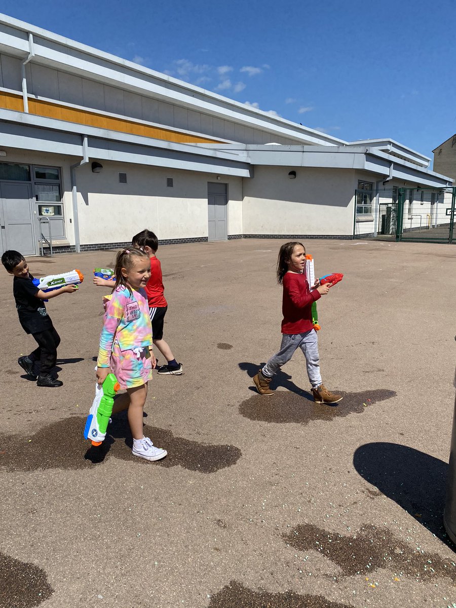 Not sure who was more soaked...the children or Miss Vasey?