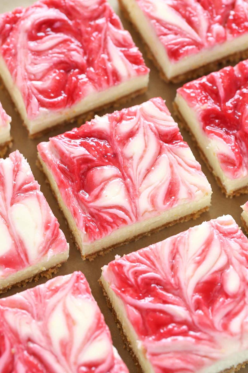 livewellbake's tweet photo. These Lemon Raspberry Cheesecake Bars feature a creamy lemon cheesecake filling with a raspberry swirl on a homemade graham cracker crust. #cheesecake #raspberrycheesecake #raspberrydessert #dessert https://t.co/tipij44Pdn https://t.co/RC3BmyawUm