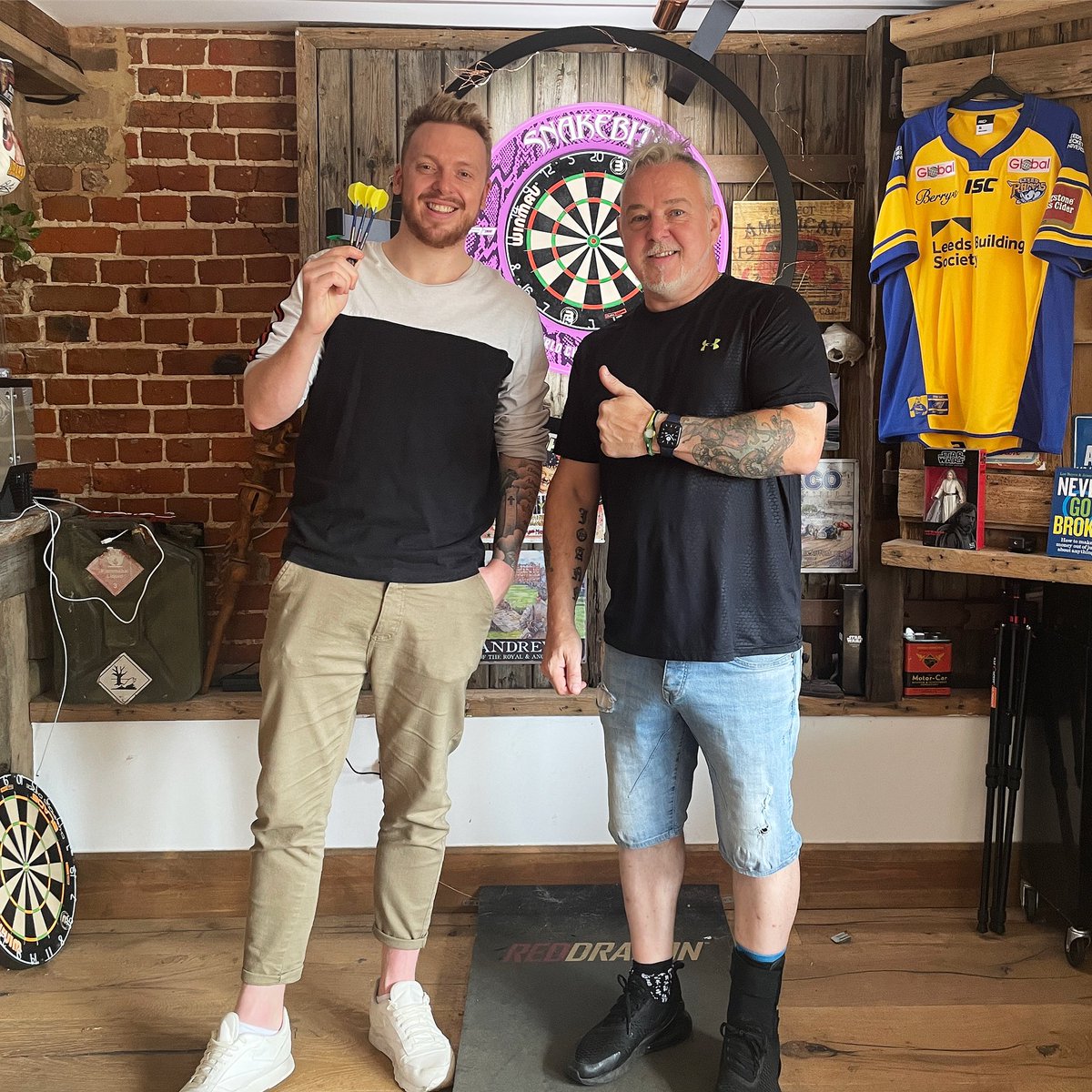 Jaack's tweet photo. Spent the afternoon round Snakebite’s house enjoying his home bar, and playing some darts! What a lovely bloke. Hero. https://t.co/ATbGDDy7fF