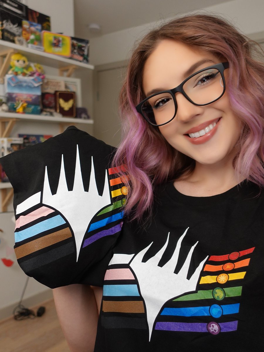 TaaliaVess's tweet photo. Thank you @wizards_magic for sending me this #MTGPride shirt. I even have an extra one to GIVEAWAY! It's a Women's fit Medium. Comment "LOVE" below to enter.
All profits go to support @Lambert_House .
Get it here➡️https://t.co/5Qm1wytFbh @MTGProShop
#Sponsored #pride 💗💛💙 https://t.co/EndyfwZTF7