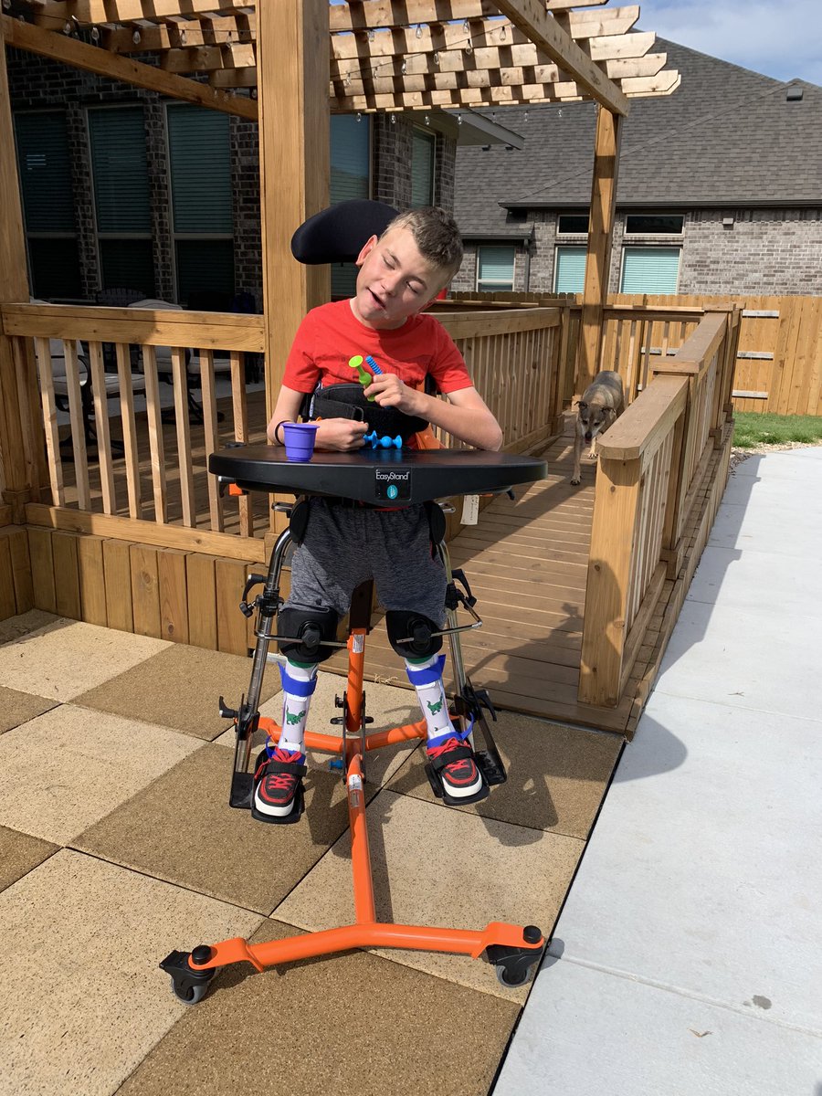 BradysBridge's tweet photo. Brady took his first trip down the backyard ramp, in his stander, this weekend. So thankful for @MakeAWishCSTX , @balfourbeatty and @LeaParkAndPlay for helping us keep this smile on Brady’s face! #wishgranted #accessiblebackyard #therapyisbetteroutside #standinginthesun https://t.co/b89aqcQKKZ