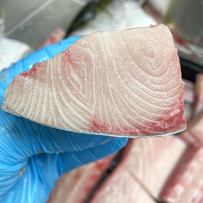 A great shot of our <a href="/SpencerGulfKing/">Spencer Gulf Kingfish from South Australia</a>'s marble pink flesh by @thefishshoppe! 🐟👌