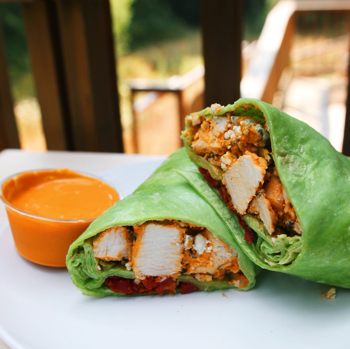 FarmToFit's tweet image. Our juicy Buffalo Chicken Wrap 🌯 with a side of summer sunshine? Yeah, we could easily get used to this...😎 #HelloSummer