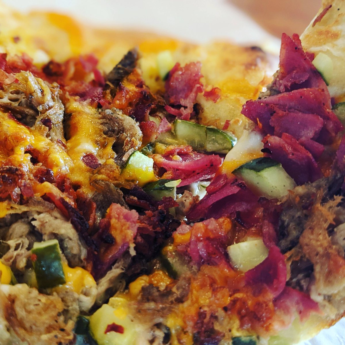 New Pizza of the Week!!!!

Our kitchen staff has done it again. This time they turned a Cuban sandwich into amazing pizza! 
All the flavors of the sandwich but still a light pizza!

Come grab it before it's gone.
