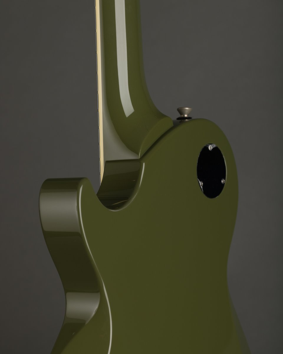 collingsguitars's tweet photo. The first Collings 290 in our Olive Drab finish!  Further enhanced by ivoroid fingerboard binding, @ThroBakdotcom 52/54 P90s, and a MojoAxe wraparound bridge.

On its way to @MusicEmporium .

#olivedrab #electricguitar #throbak #P90 #handmade #atx #collingsguitars https://t.co/7BSytYORXr