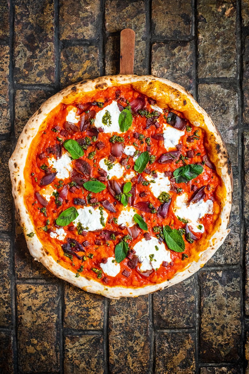 A thing of beauty. ❤️ Goat Salami by Cobble Lane Cured, Goats Curd, BBQ burnt Onions with Soy⁠
&amp; Chilli, fresh Mint and Pesto... on that dough of ours you love so much.