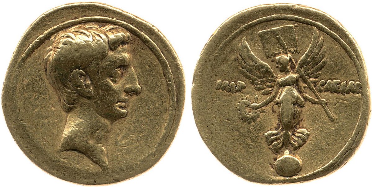 A #Roman aureus minted under Octavian - pictured in a fairly simple portrait - with a reverse design showing the goddess Victory, standing on a globe, holding a victory wreath in her right hand, & a vexillum military standard in her left #Numismatics #RomanCoins