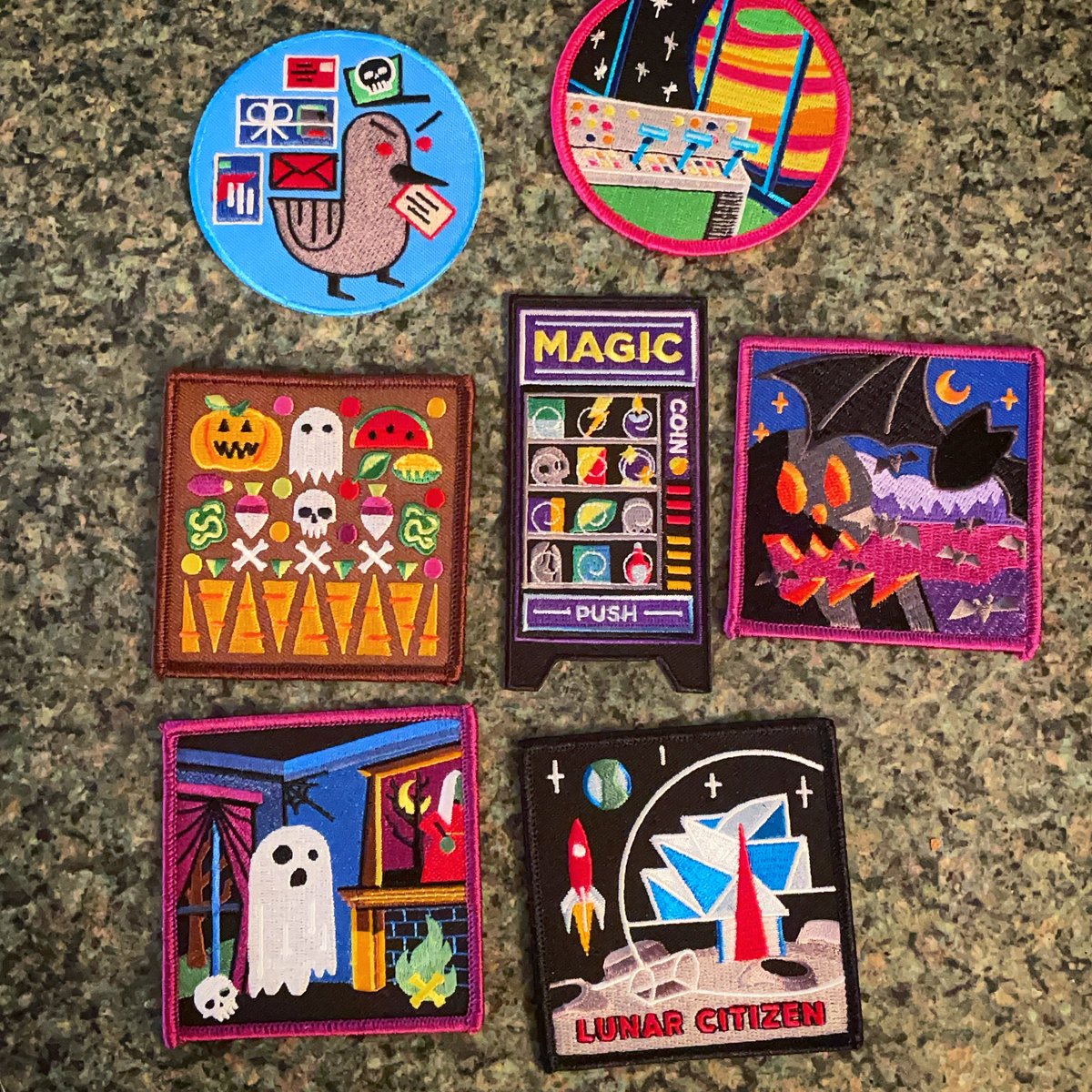 A collection of Halloween and sci fi patches