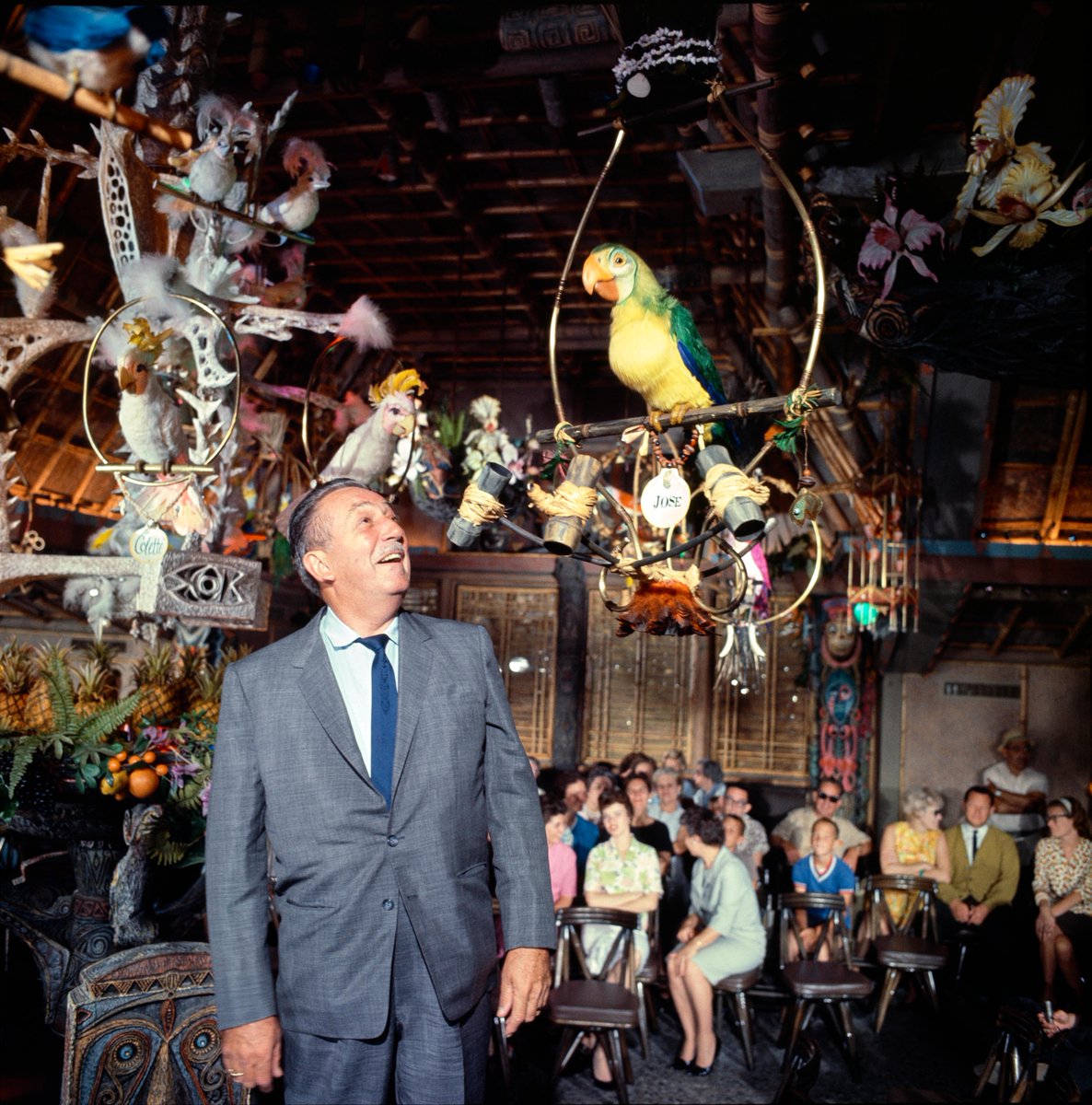Disney's tweet photo. On this day in 1963, Walt Disney’s Enchanted Tiki Room made its crooning debut at @Disneyland Park! 🦜 https://t.co/bYj9i2XMIS