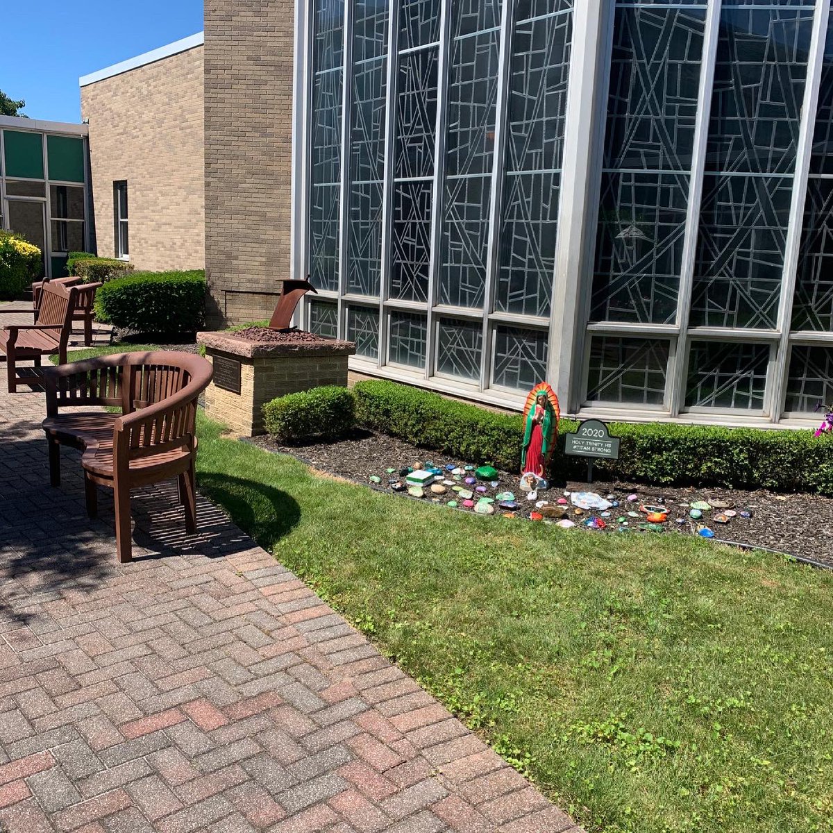The Titan Class of 2020 Rock Garden is on full display! The garden features  the Our Lady of Guadalupe statue alongside the painted stones designed by our alumni 💚
