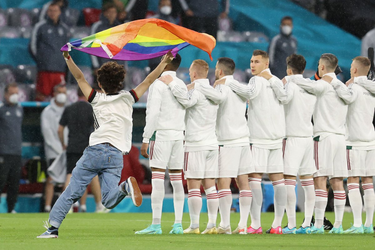 heatherowens33's tweet photo. Heroes dont wear capes. The run past the Hungarian team with a pride flag 🥰🏳️‍🌈. #GERHUN https://t.co/W4QeY9HBuG