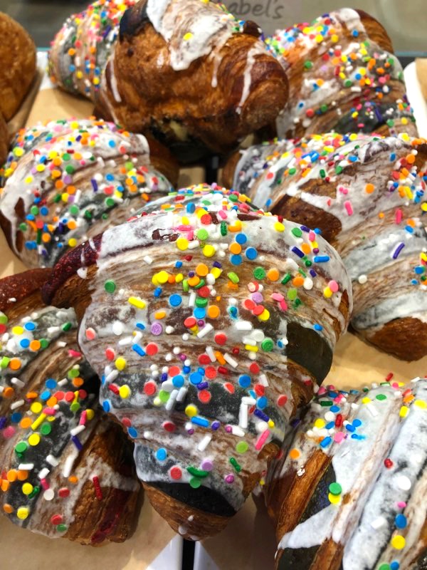 MabelsBakery's tweet photo. They're officially here! Our Rainbow Croissants are back for a limited time only🌈 Pick up your colourful treat in-store, with every purchase of our Pride items we will be donating 1$ to the local organization @The519 who supports the health and wellness of the LGBTQ2S community! https://t.co/E0FCefMajI