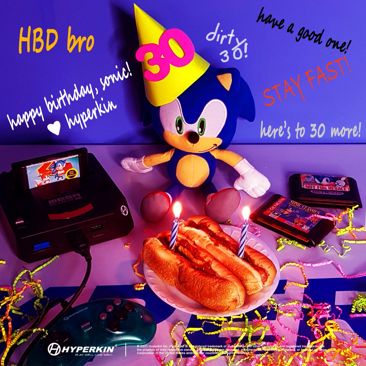 Sonic the Hedgehog plush with a birthday hat, two chili dogs (with lit birthday candles), and various Hyperkin items around him.

Text reads:
"HBD bro"
"happy birthday, Sonic! Love, Hyperkin"
"dirty 30!"
"have a good one!"
"Stay Fast!"
"Here's to 30 more!"