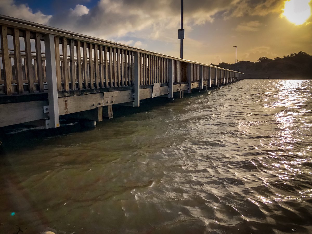 High tide at the Southport footbridge, highest it’s been in a long time.