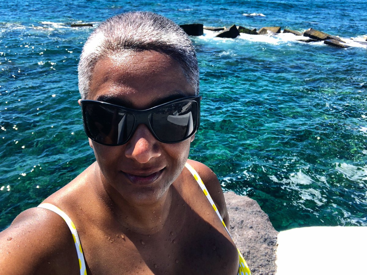 ProfSunnySingh's tweet photo. Adding. These pics are from almost exactly 2 years ago when I was applying for my professorship while hanging out on the beach because yes it’s possible to decolonise theory, challenge systemic inequity and still rock yellow polka dot bikinis and wrap dresses #ModestAcademic https://t.co/q1e5oTG1zS