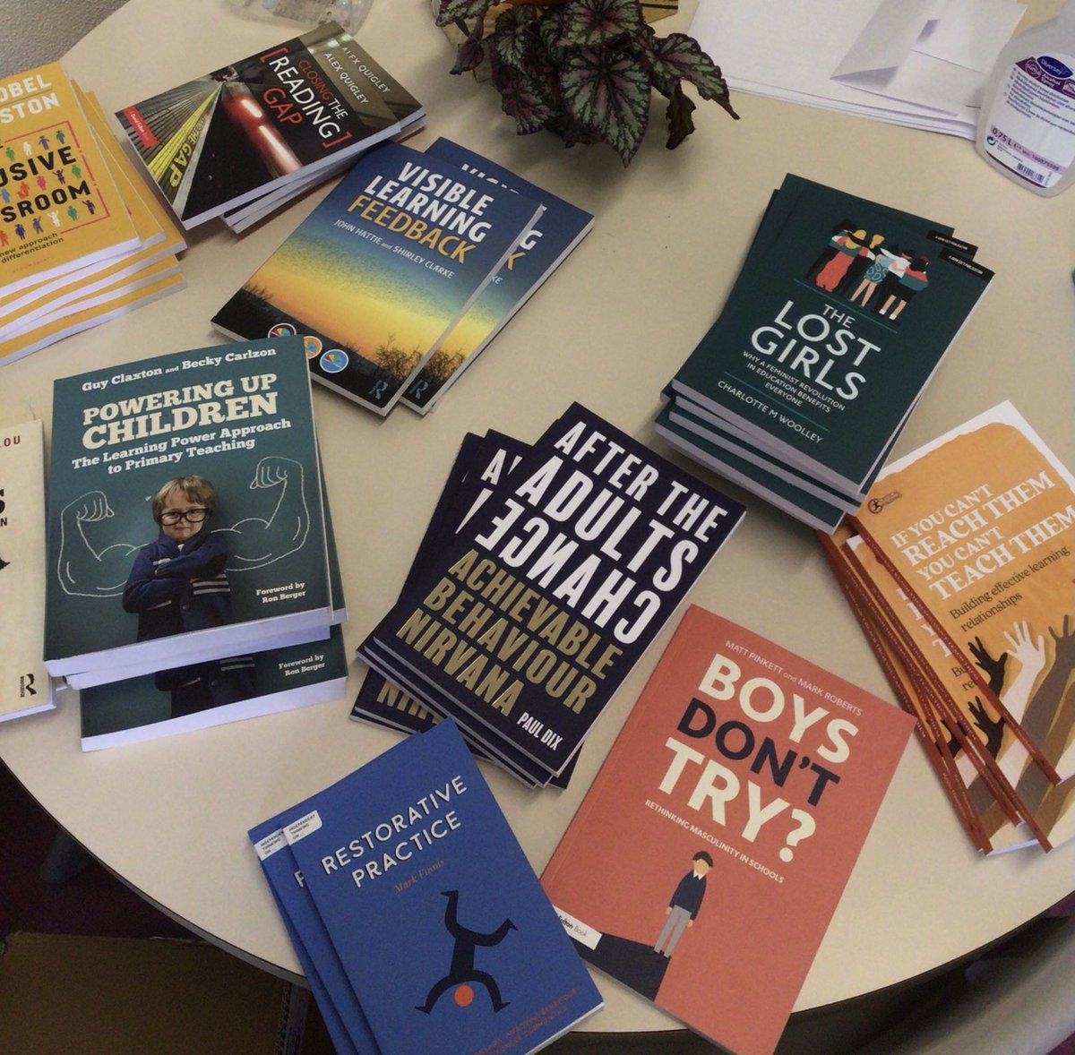 StJuliansCPL's tweet photo. We are setting up our Professional Learning Library with new books that staff can borrow for some summer reading. Teachers modelling learning excellence, inspired by Sonia Thompson’s webinar yesterday on the ethics of excellence.  ⁦@son1bun⁩ #TheJoyOfLearning https://t.co/mUB0dWNjzq
