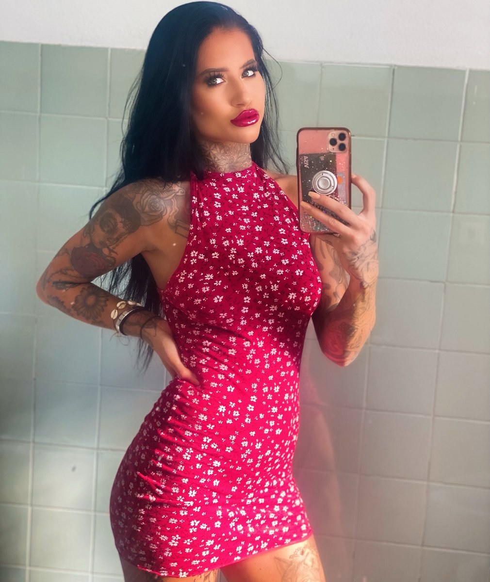 Lady in red ❤️ <a href="/Mamboibiza/">Cafe Mambo Ibiza</a>