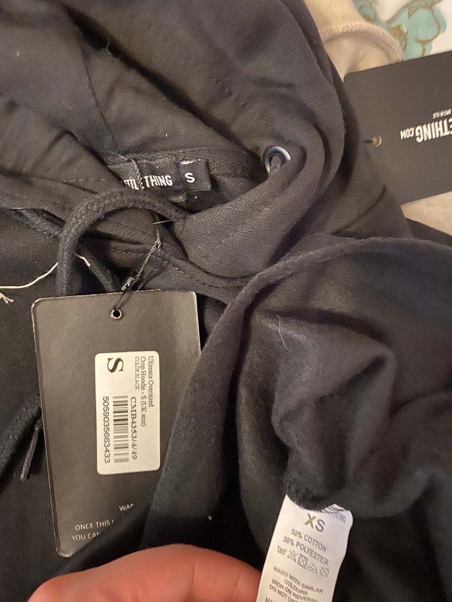 Ismay_Beauty's tweet photo. @OfficialPLT not acceptable that these hoodies are supposed to be the same sixe - the black hoodie is a small on the neck label and xs on the inside label. Really annoyed I will have spend time returning this. Please can you send out new black hoodie ASAP https://t.co/uWYLX1qJJJ