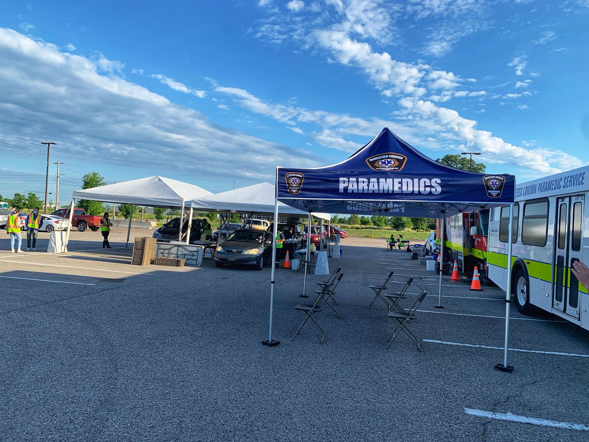 MLPS911's tweet photo. Our 1st ever drive-thru COVID- 19 vaccine clinic is up and running! Thank you @Cargill  for hosting! Shout out to @CountyMiddlesex @CityofLdnOnt @MLHealthUnit @FanshaweCollege for all of your support! https://t.co/GCBbsviqJK