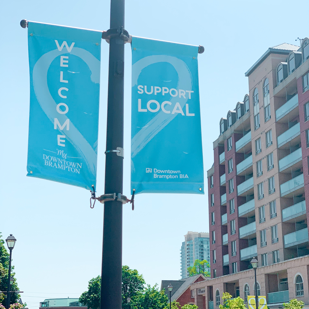 Just in time for COVID restrictions to be lifted, <a href="/bramptondtbia/">Downtown Brampton</a> reached out to Razor Creative to design a new set of street banners, to let Bramptonians know that their favourite downtown shops are once again open for business! #SupportLocal 💙