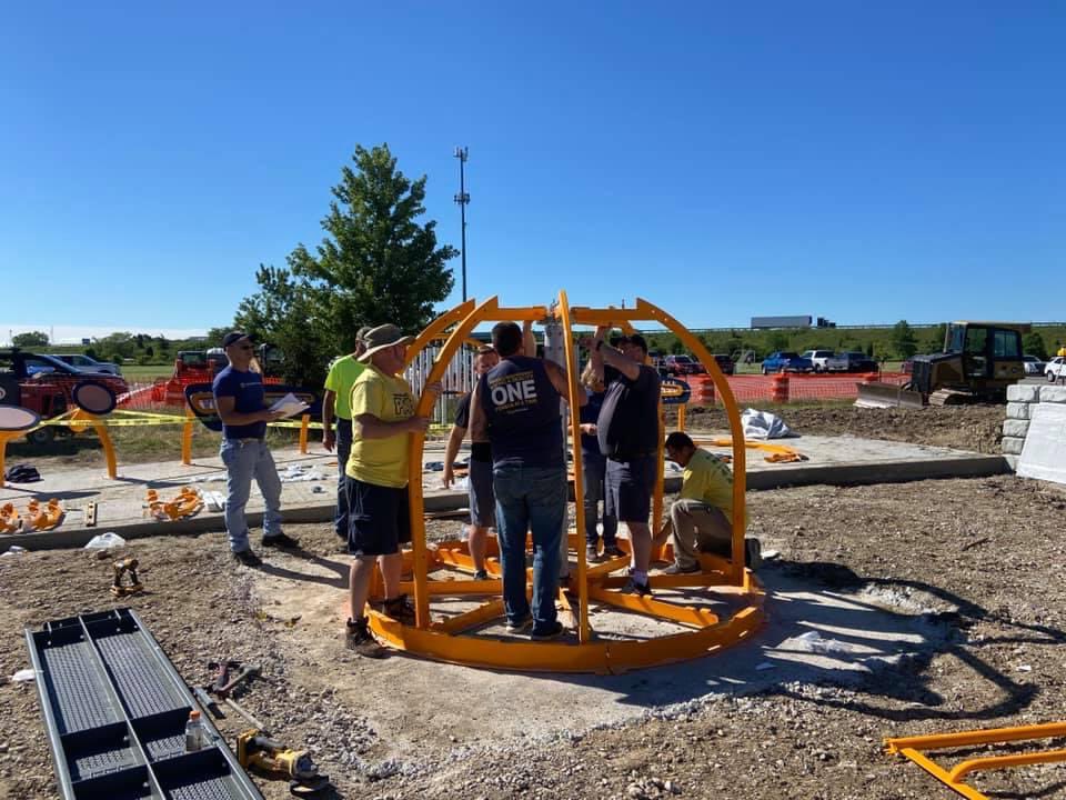 From Wood County Plays: 
We’re kicking off Day 2 of the build. More amazing volunteers today building the playground bolt by bolt. 
Special thanks to PJ Print PLUS for the bright yellow shirts for Volunteers! Stay tuned for more updates. Some exciting pieces of equipment going up