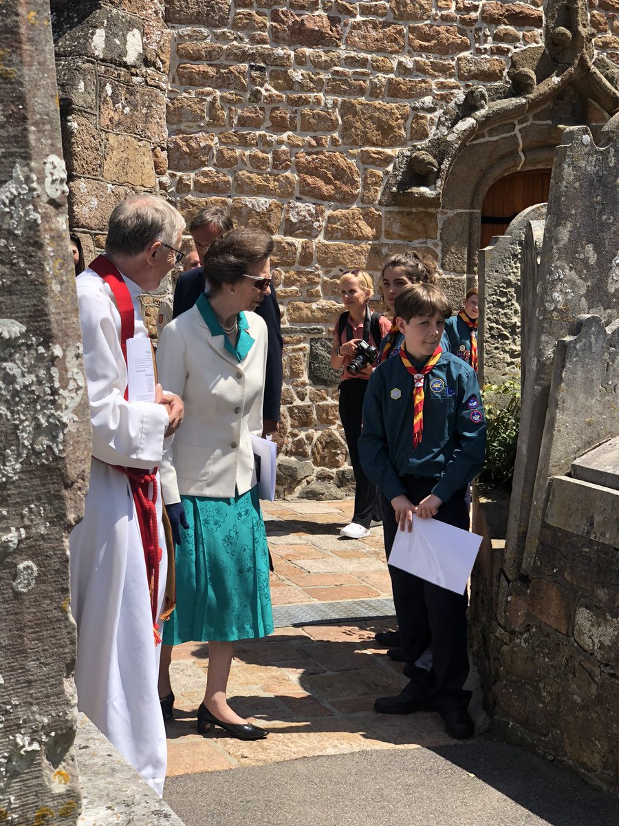 elisa_silver1's tweet photo. HRH Princess Anne hearing about the war veterans buried at St Saviour’s Church from scouts and the Rev Peter Dyson. The Princess also unveiled a memorial plaque as part of the service. @BBCJersey https://t.co/p7xHbpV0N3